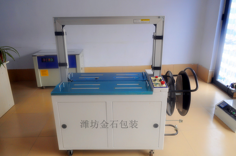 B-201A全自動(dong)桌面滾筒傳(chuán)動型打包機(ji)捆紮機