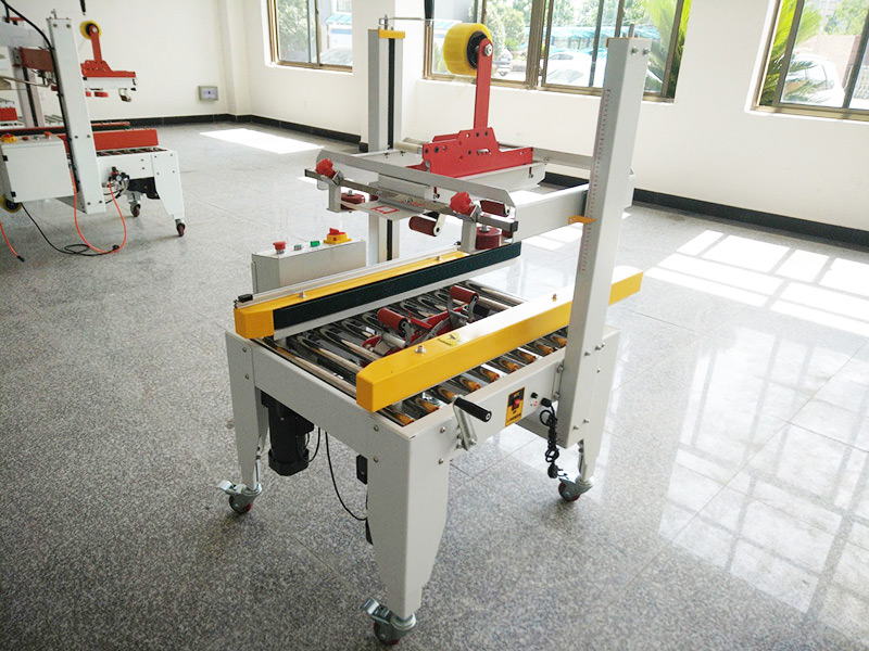 JS-FXZ500B 左(zuǒ)右驅動(dòng)配聯線(xian)手動自(zì)動折蓋(gai)膠帶封(fēng)箱機