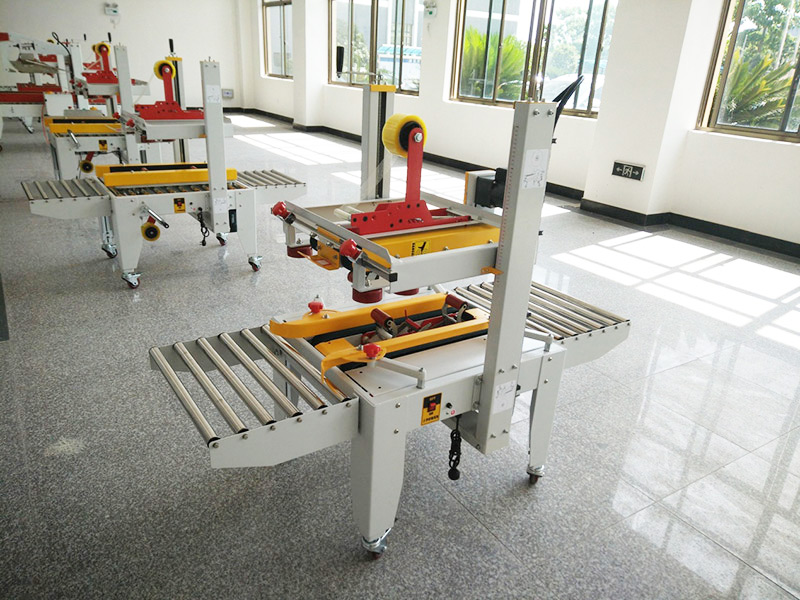 JS-FX500C 上下驅(qū)動手動折蓋膠(jiāo)帶封箱機